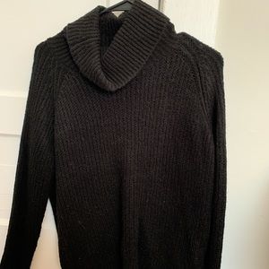 Black turtleneck sweater.